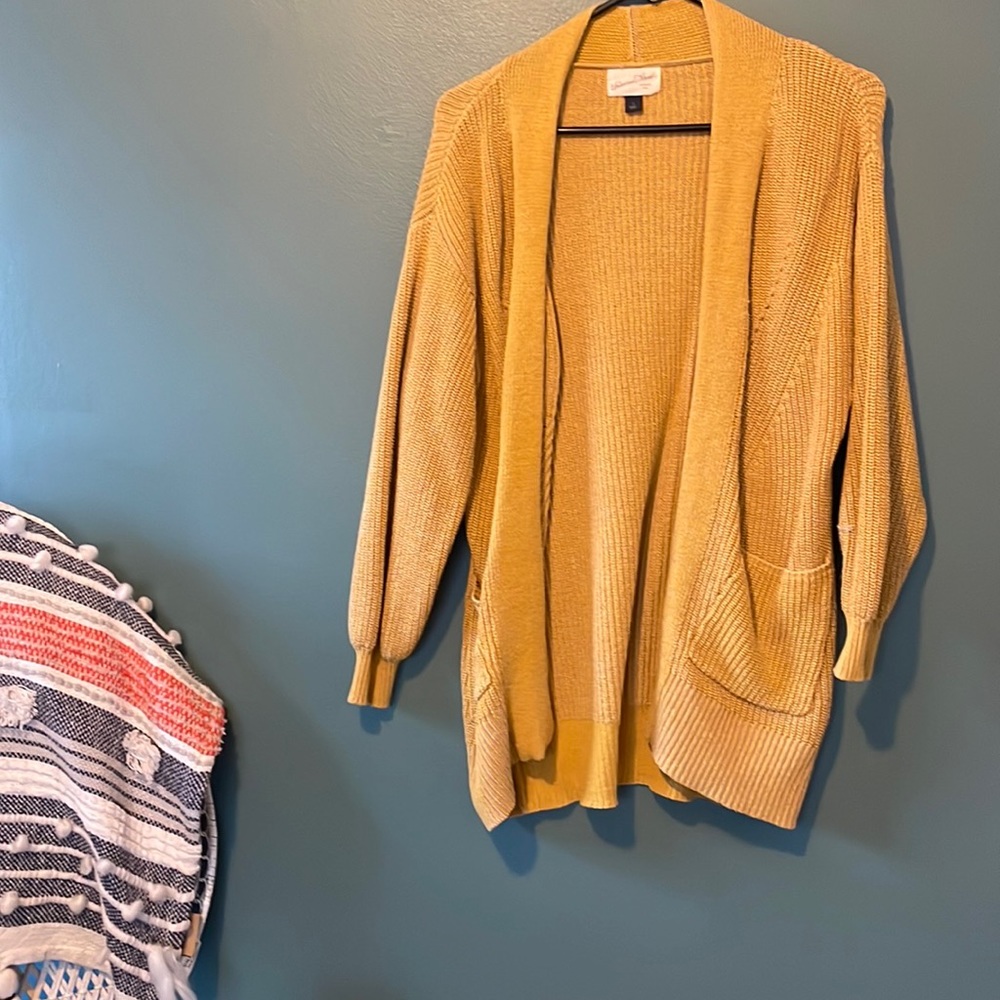 Yellow open cardigan with pockets
